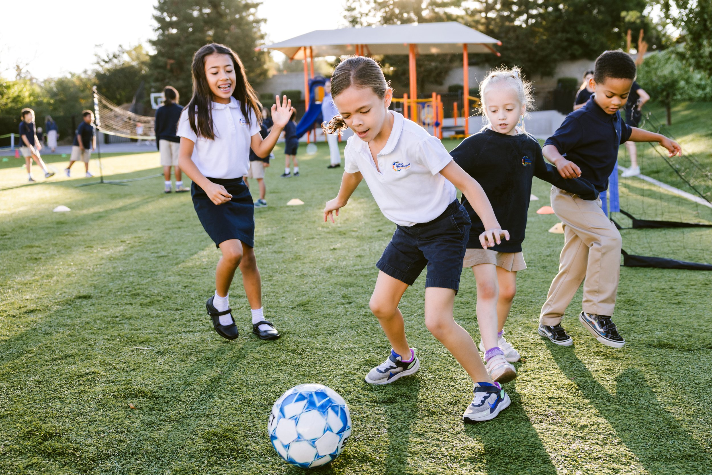 children playing football