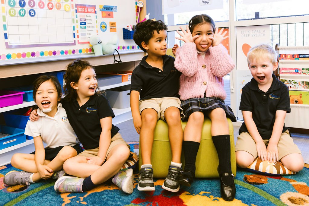 A group of students smiling and laughing.