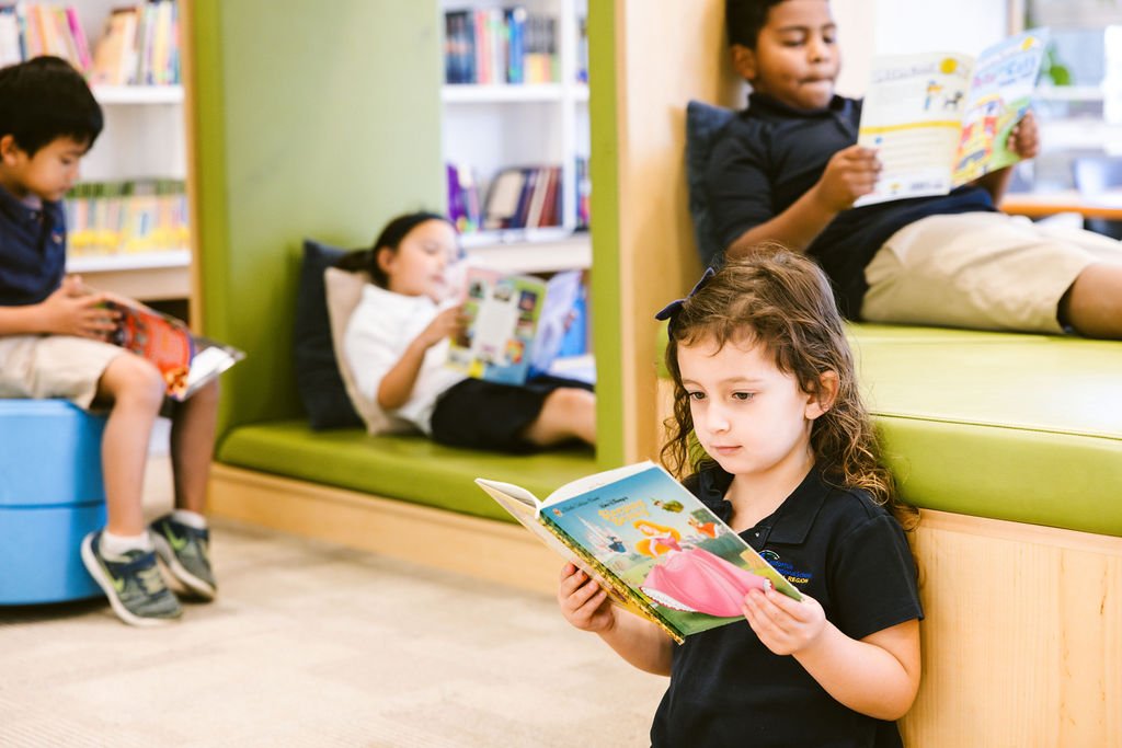 Students reading in modern library