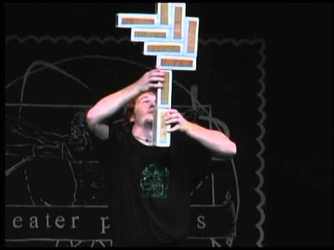 A student performs a block balancing trick at Theatre Physics 9 (2002)