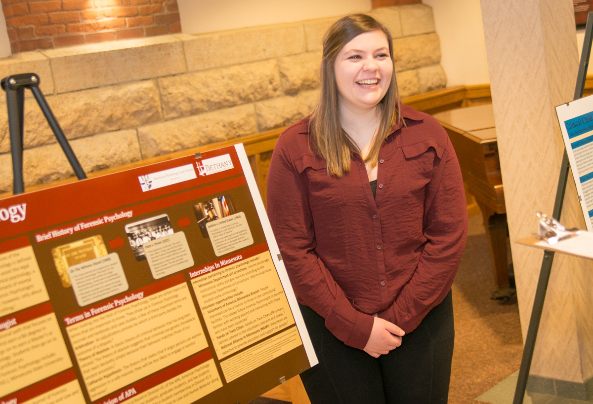 Junior Hayli Mathe at the poster session in Old Main.