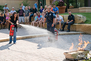 Djem Ferkenstad extinguished flames as part of a safety training exercise.