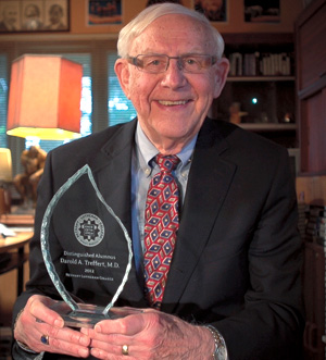 Dr. Darold Treffert with Distinguished Alumnus award