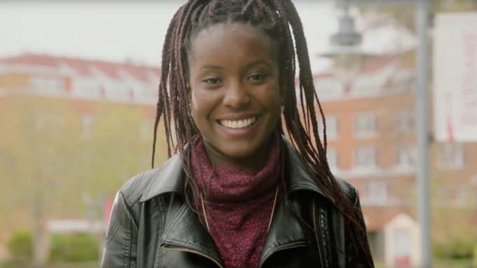 Female student smiling at camera