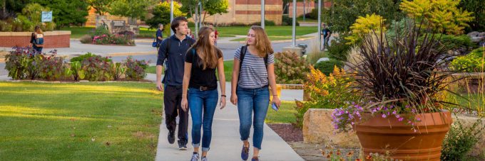 Students walking to class in Honsey Hall