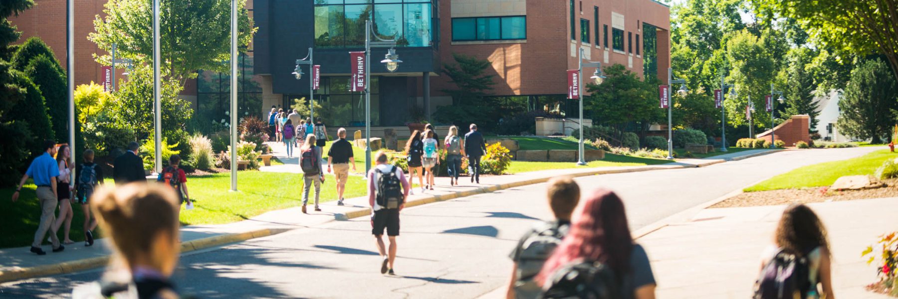 Students walking between Honsey Hall and Meyer Hall