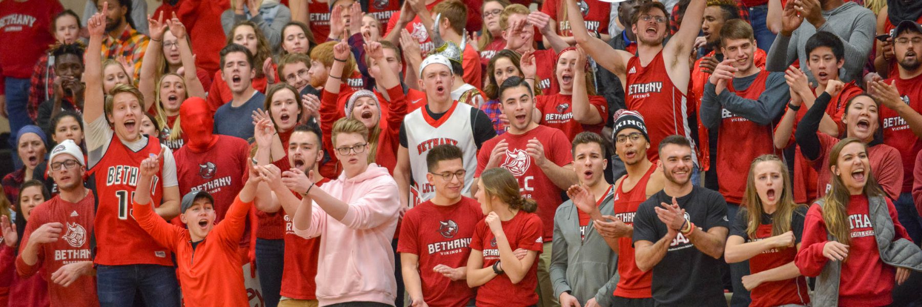 Fans at basketball game in North Gym of Sports and Fitness Center