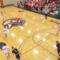 Basketball team during game in North Gym of Sports and Fitness Center