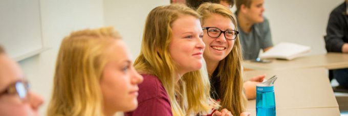 Female students in sign language class