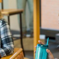 Students laughing in Honsey Hall Lantern during psychology class