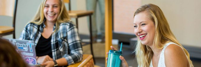 Students laughing in Honsey Hall Lantern during psychology class