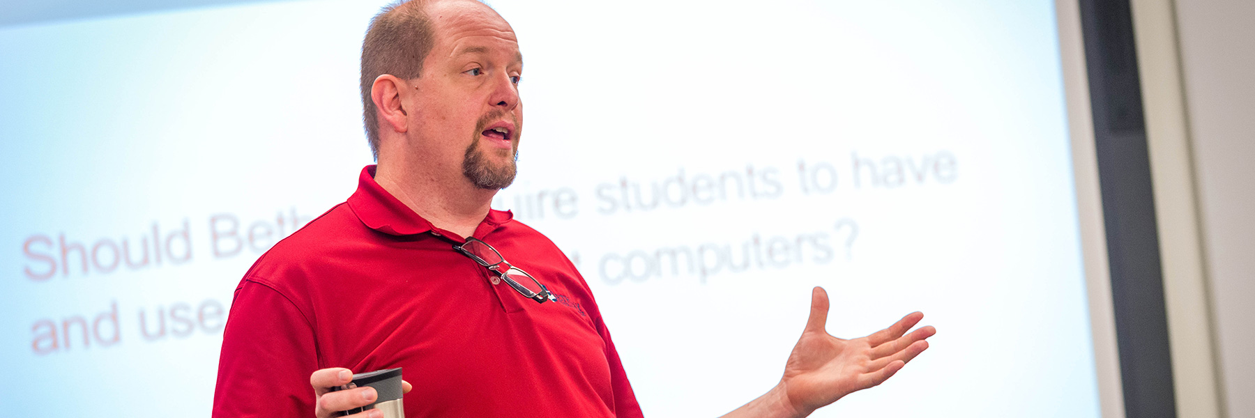 Professor Jon Loging teaching in class.