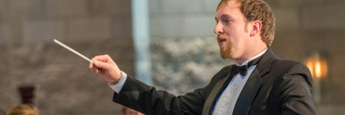 Professor Faugstad conducting musicians