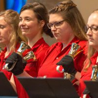 Handbell choir playing in Trinity Chapel.