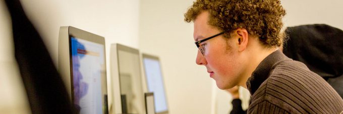 student looking at computer screen