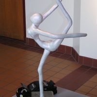 Sculpture of dancing human form on display in the art gallery