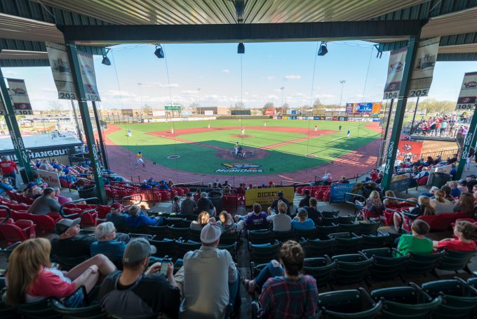 Fans in the stands at Franklin Rogers field for the Bethany at the Ballpark event, with the field and players visible in the background