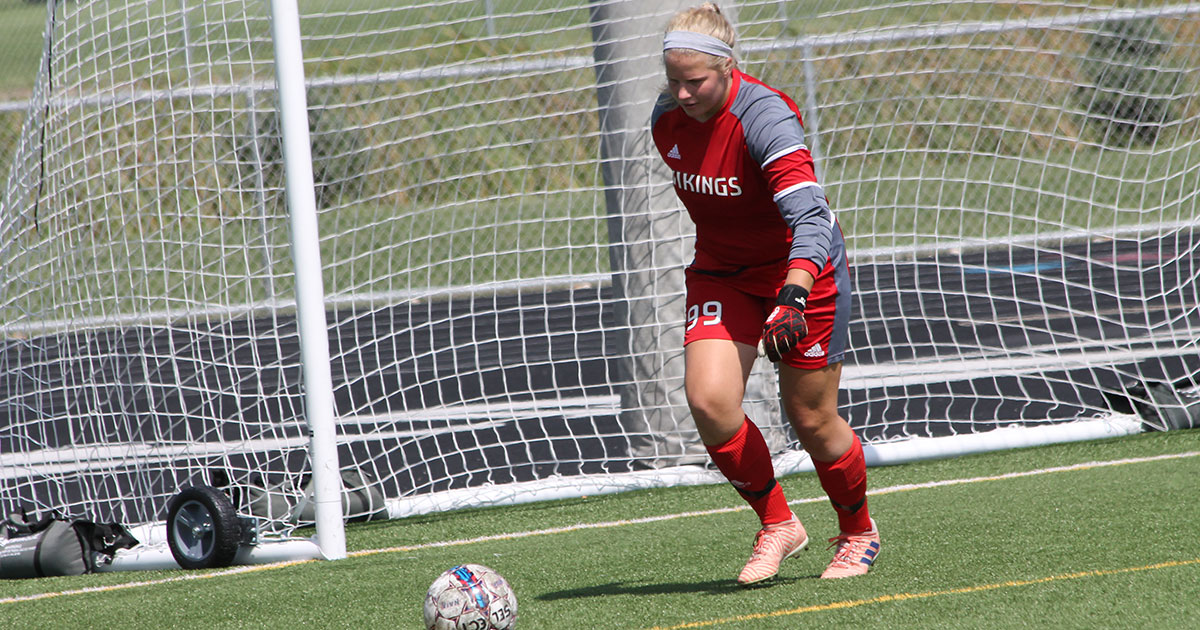 Bethany Lutheran women's soccer player readies to kick the ball