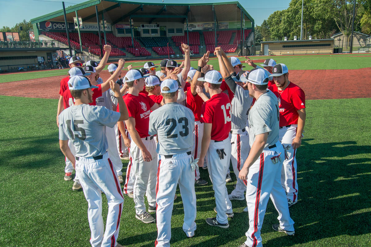 baseball players in a huddle