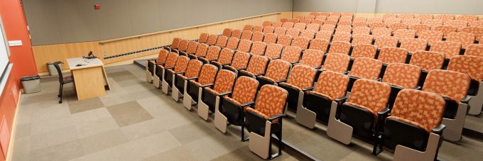 Film viewing room with theatre-style chairs