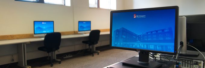 computer monitors on tables