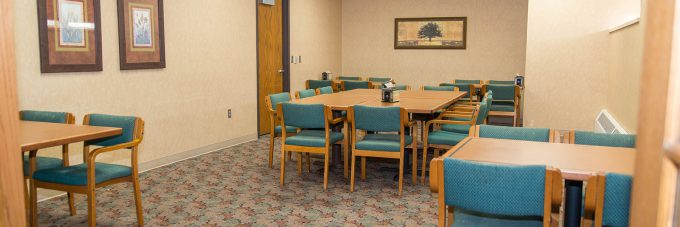 tables and chairs in a private dining area