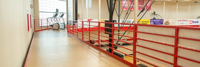 running track elevated above a gym