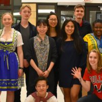 students from the world club pose for a group photo