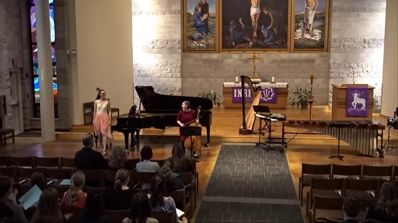 A Bethany student sings at the New Music Recital, accompanied by another student on double bass