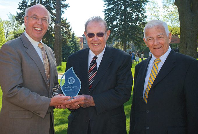 From left: President Dan Bruss, Alfred Schwan, and commencement speaker Rev. Larry Burgdorf. (2008)