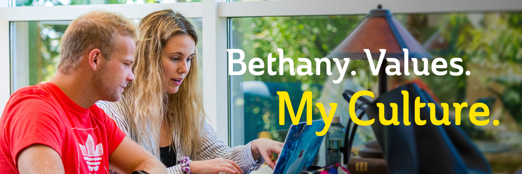 Bethany. Values. My Culture. An American student and an international student work together at a computer.