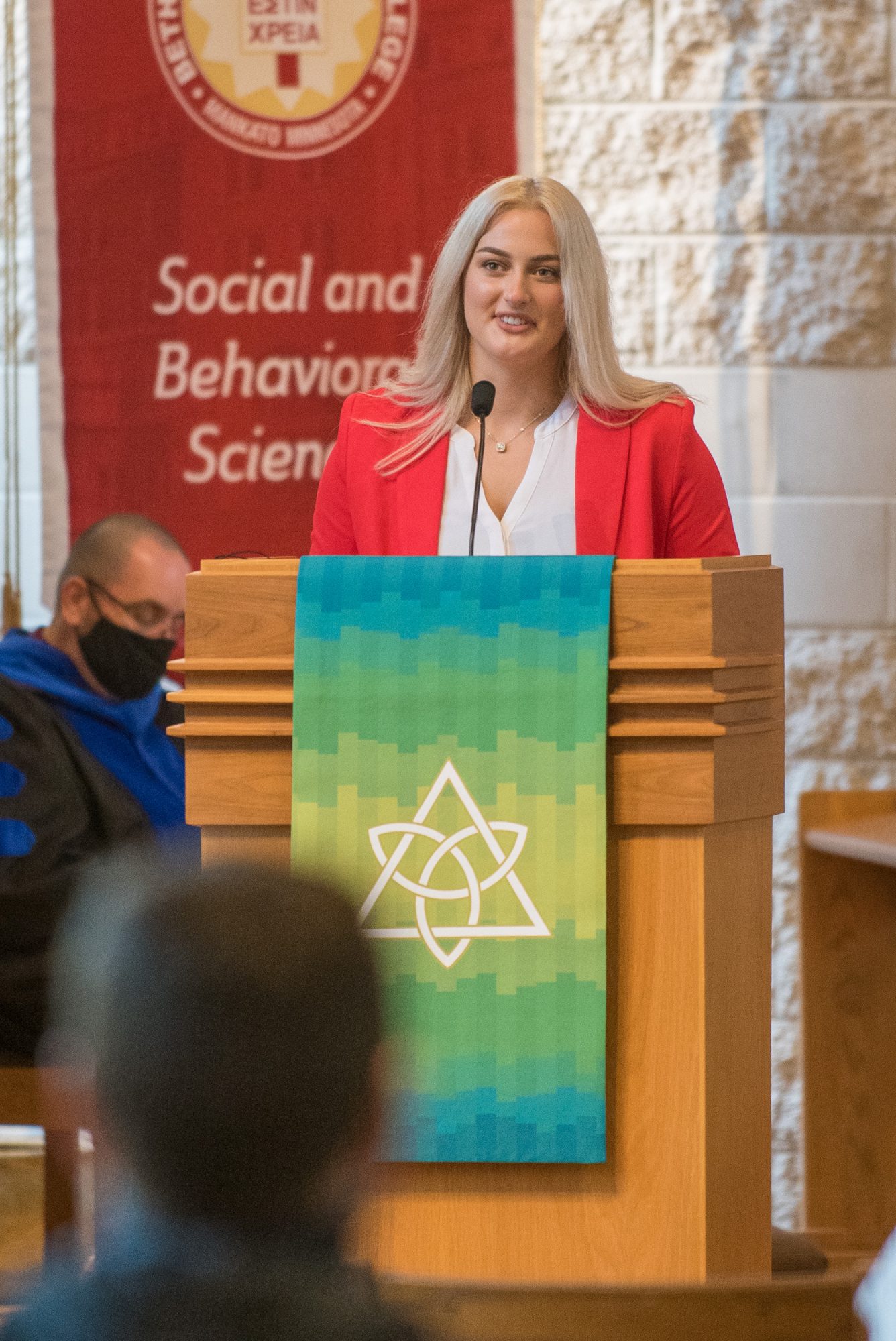 Student Senate President Karena Verbitzky speaking during chapel