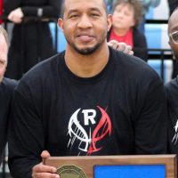 Bethany alumnus Omar McMillan. Male basketball player with MSHSL award/plaque