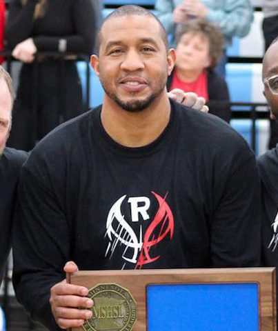 Bethany alumnus Omar McMillan. Male basketball player with MSHSL award/plaque