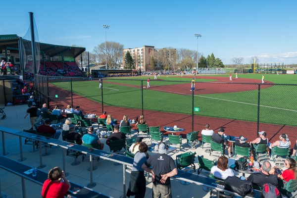 View of ISG baseball field from left field bleachers with spectators watching the game