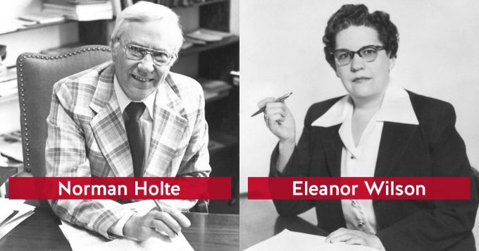 Norman Holte and Eleanor Wilson each sitting at their desks