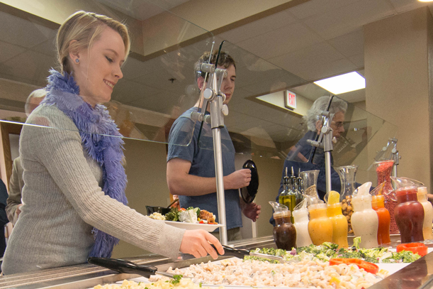 Student grabbing food in Dining Center