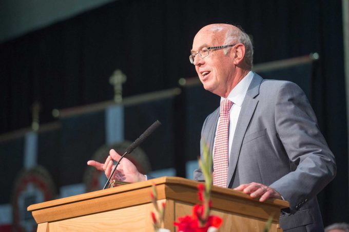 President Emeritus Dan Bruss speaking at the 2017 spring commencement ceremony