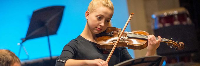 female playing violin