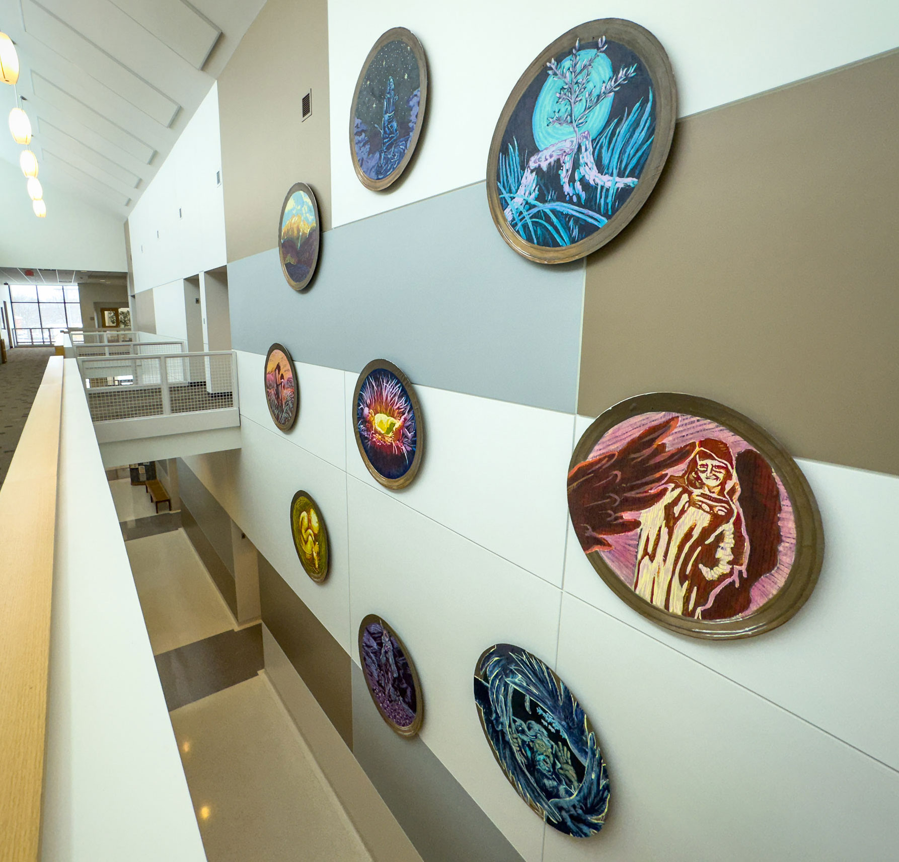 The nine circular paintings displayed in Honsey Hall