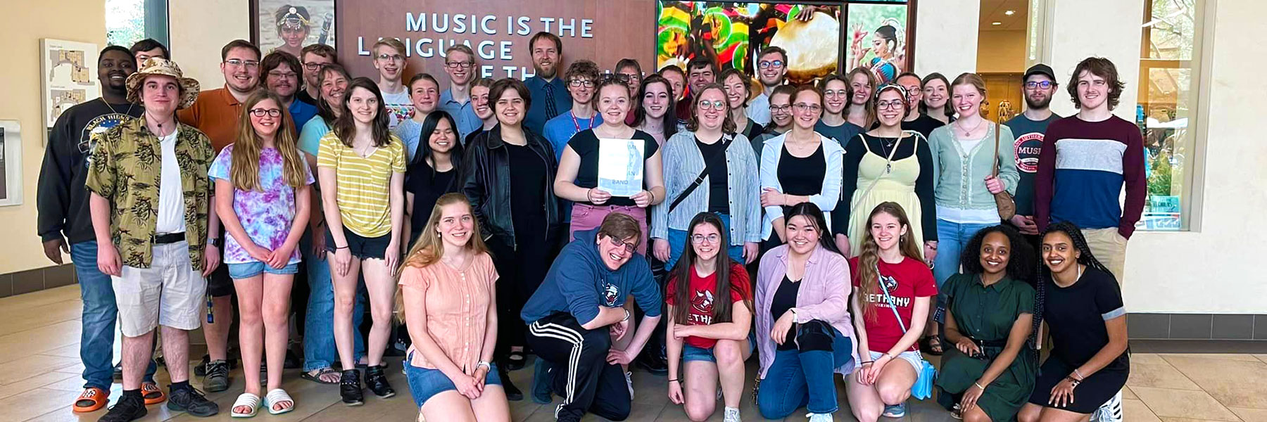 group photo of students at music instrument museum