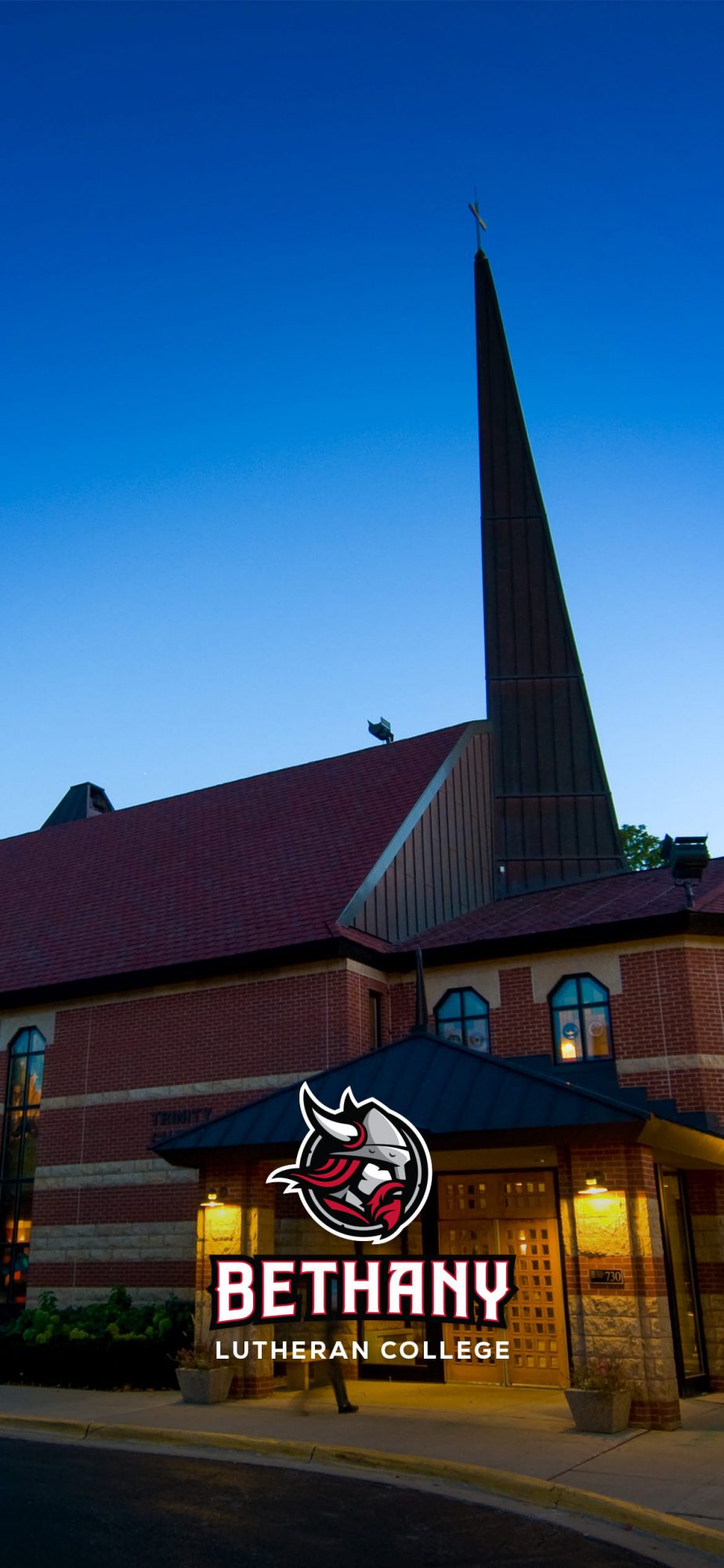 Phone wallpaper photo of Trinity Chapel at nighttime