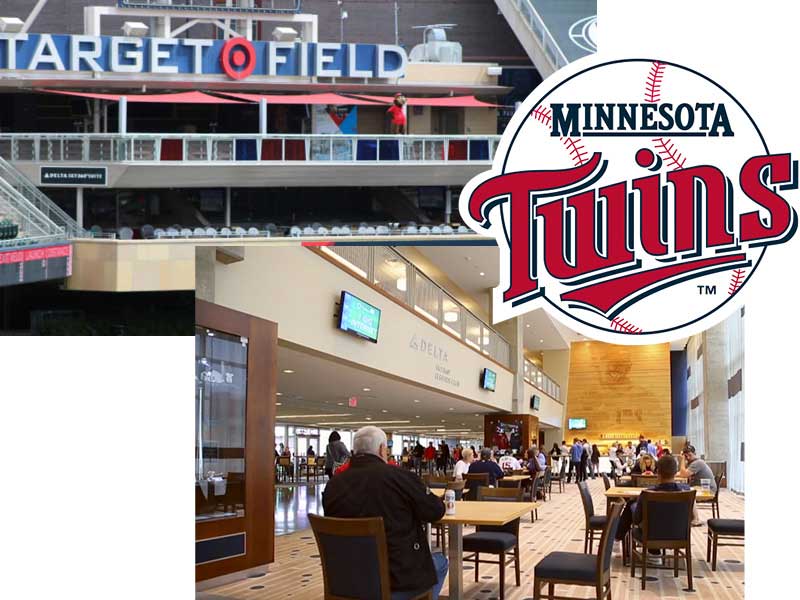 minnesota twins logo and stadium seating with suite tables and chairs