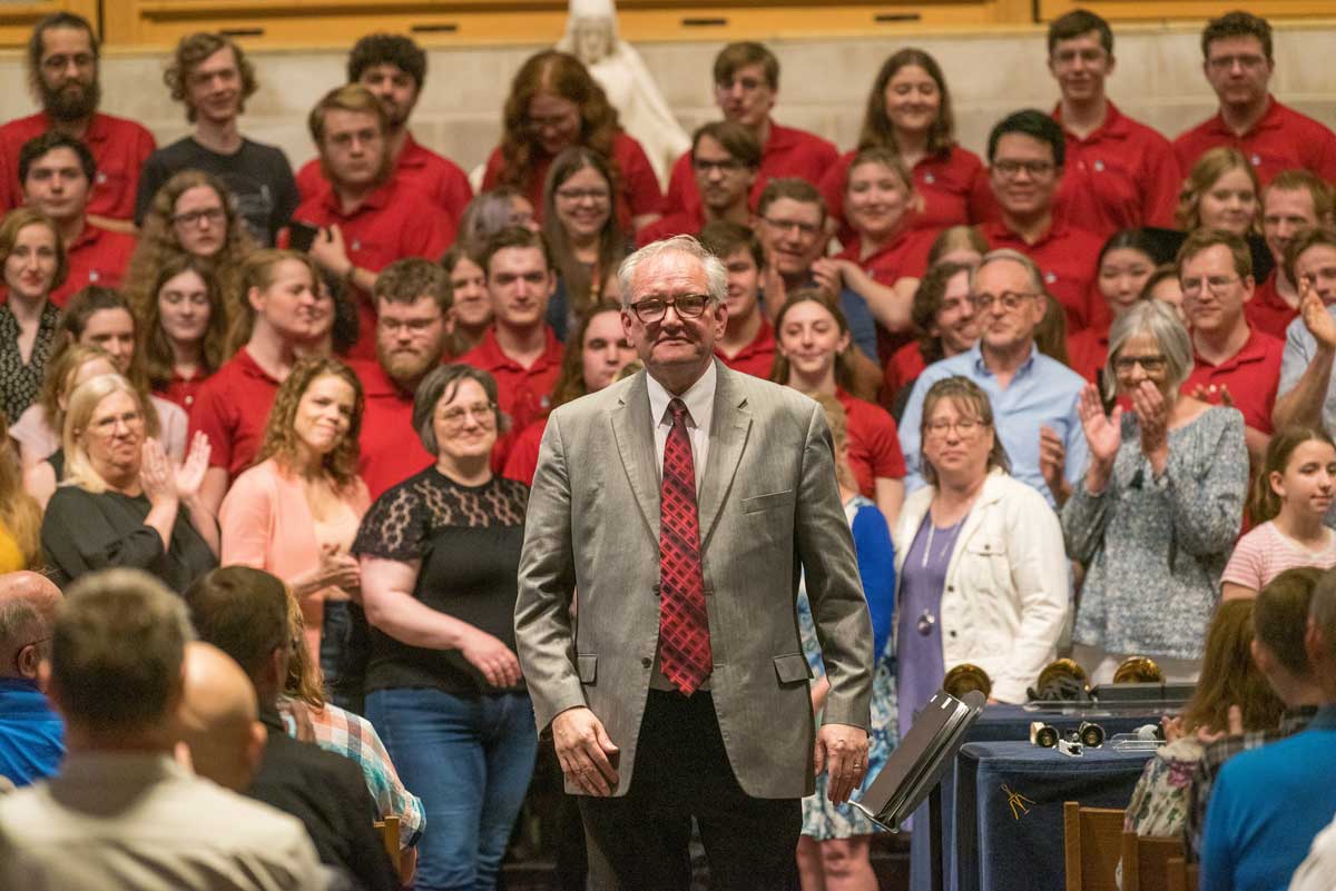 Dennis Marzolf final walk out at choir performance, choral fest, Bethany Magazine