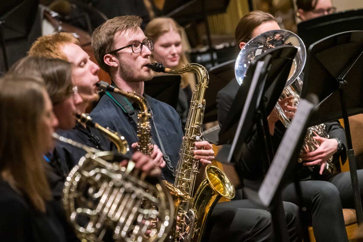 Boy playing instrument, Jake Marzinske playing instrument